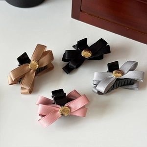 Set di eleganti mollette per capelli a fiocco in nero, rosa, grigio e marrone chic
