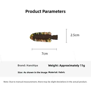 Detailed size view of the 7cm x 2.5cm colorful woven fabric hair clip for women