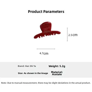 Vue détaillée de la pince à cheveux en acétate rouge faite main, 4,7x2,5 cm et 5,2g