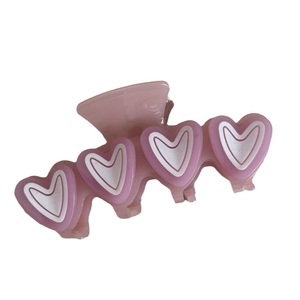 Pink heart-shaped claw clip for women featuring elegant double-layer jelly resin design