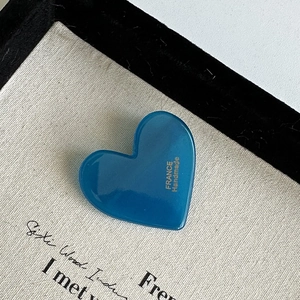 Handmade heart-shaped blue acrylic hair clip with premium gold leopard texture print