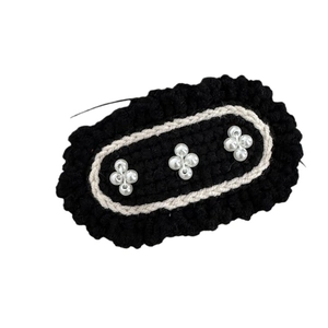 Handmade black and white crochet hair clip with elegant pearl flower decorations