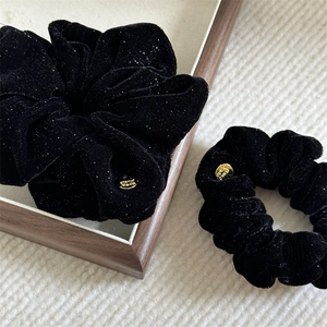 Sparkly black velvet scrunchies with gold handmade tag for vintage women hairstyle