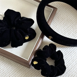 Elegant black velvet hair accessory set including headband and scrunchies with gold charms