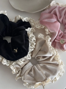 Three-piece velvet lace scrunchie set in black, pink, and beige with gold charms