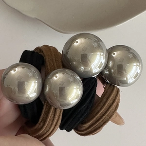 Elastic hair ties with large metallic champagne balls in silver and gold mirror finish