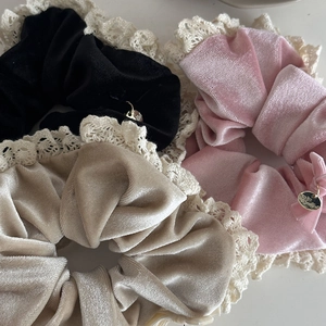Three-piece velvet hair scrunchie set with white lace trim and gold charm accents