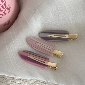 Lot de trois pinces à cheveux élégantes en acétate rose et violet avec base dorée