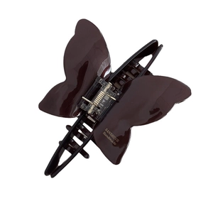 Elegant butterfly acetate hair claw clip in dark brown with high gloss finish and spring