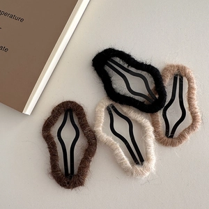 Set of four plush wave-textured BB hair clips in assorted neutral autumn colors