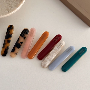 Détails de pinces à cheveux en acétate coloré avec marquage doré artisanal de qualité