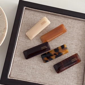 Set of five rectangular acetate hair clips in coffee colors with a French handmade finish