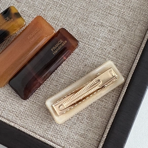 Rectangle acetate hair clips set in tortoiseshell and amber colors for women