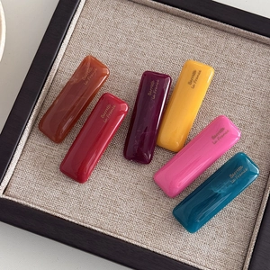 Set of 6 colorful resin duckbill hair clips with gold Barrette la France logo