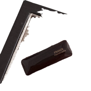 Brown rectangular acetate hair clip with gold France Handmade text on white background