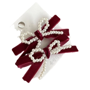 Handmade dark red velvet bow hair clips with faux pearl accents for women and girls