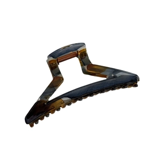 Minimalist geometric acetate claw clip with dark grey and amber marble pattern