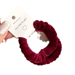 Burgundy velvet scrunchies with soft texture and elastic hair ties for women and girls