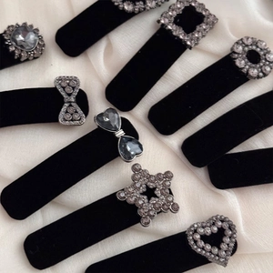 Vintage velvet hair clips set with grey rhinestones and elegant geometric shapes