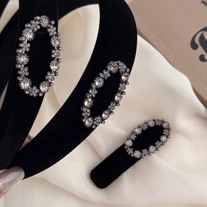 Elegant black velvet headband with oval crystal rhinestone embellishments for women