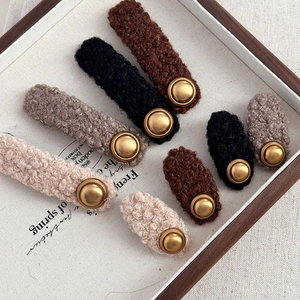 Elegant plush hair clips set with vintage gold buttons in autumn winter colors