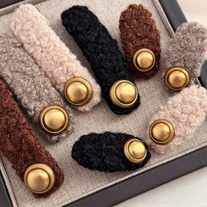 Sherpa fleece hair clips set with vintage gold buttons in five assorted neutral colors