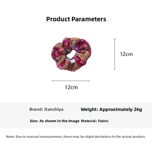 Detailed view of red knitted headband with size measurement showing 12cm by 12cm