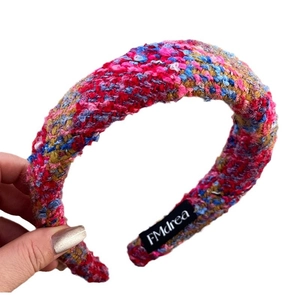Elegant festive red tweed headband with colorful woven textures for Christmas styling