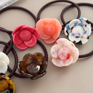 Elegant floral acetate hair ties with camellia design in multiple stylish colors
