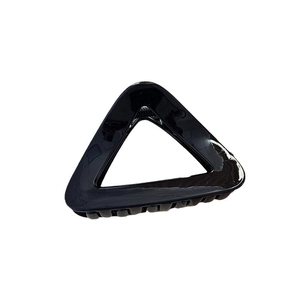 Minimalist black triangle hair claw clip with glossy finish for half-up hairstyles