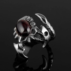 Gothic scorpion ring for men featuring a deep red gemstone set in polished silver steel