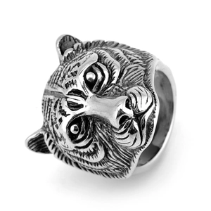 Detailed relief of an aggressive tiger head on a vintage silver titanium steel ring