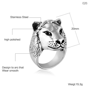 Detailed macro view showing the 20mm height and weight of the polished steel lion ring