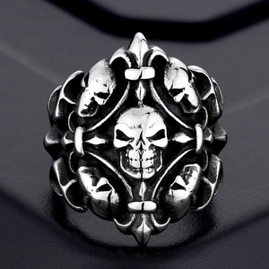 Vintage gothic men's stainless steel ring with five skulls and a retro silver finish