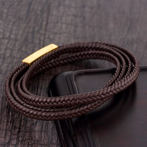 Men's multilayer brown braided leather wrap bracelet with a polished gold magnetic clasp