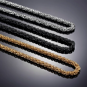 Bracciale da uomo in acciaio al titanio stile bizantino nei colori oro e nero