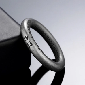 Matte finish retro steel ring with engraved numbers 1314 and Manifest of Distinction