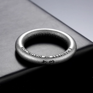 Vintage industrial style stainless steel ring with A MANIFEST OF DISTINCTION engraving
