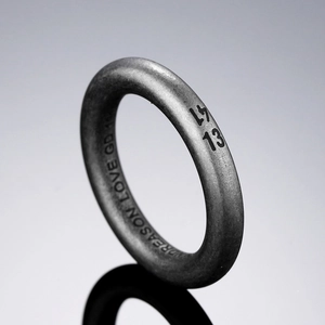 Vintage industrial style stainless steel ring with 17 13 engraving and aged finish