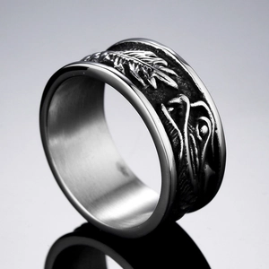 Men's vintage black skull ring in titanium steel with detailed feather relief pattern