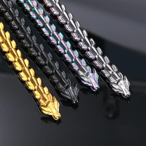 Men's dragon head bracelets in gold, black, rainbow, and silver stainless steel finishes
