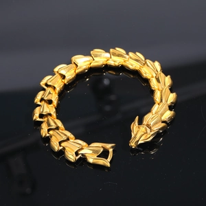 Men's bold golden stainless steel dragon bone bracelet with polished link texture