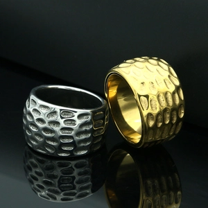 Polished men's stainless steel rings in gold and silver with unique hammered texture finish