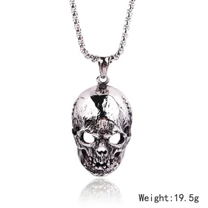 Gothic punk stainless steel skull pendant with chain showing dimensions and vintage texture