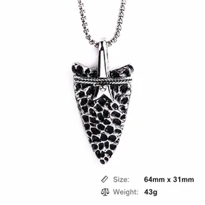 Arrowhead pendant necklace in stainless steel with black and white rock texture and star detail