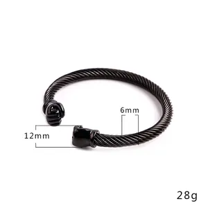 Bracelet manchette pour homme en acier noir torsadé avec extrémités en forme de poing