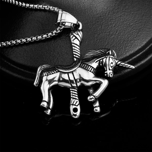 Polished stainless steel unicorn carousel pendant necklace on a sleek black leather surface
