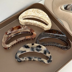 Set of four luxury acetate hollow crescent hair claws in marble and tortoiseshell patterns