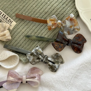 Chic acetic acid bow hair clips with marble texture and tortoiseshell patterns