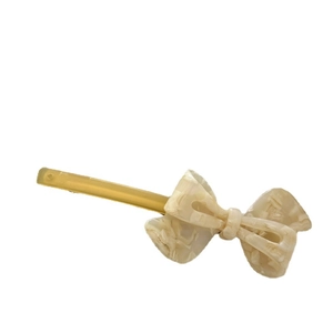 Elegant white marble acetate bow hair clip with a 3D design and vintage spring metal clamp